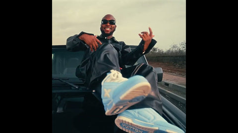 King Promise wearing NO FUGAZI