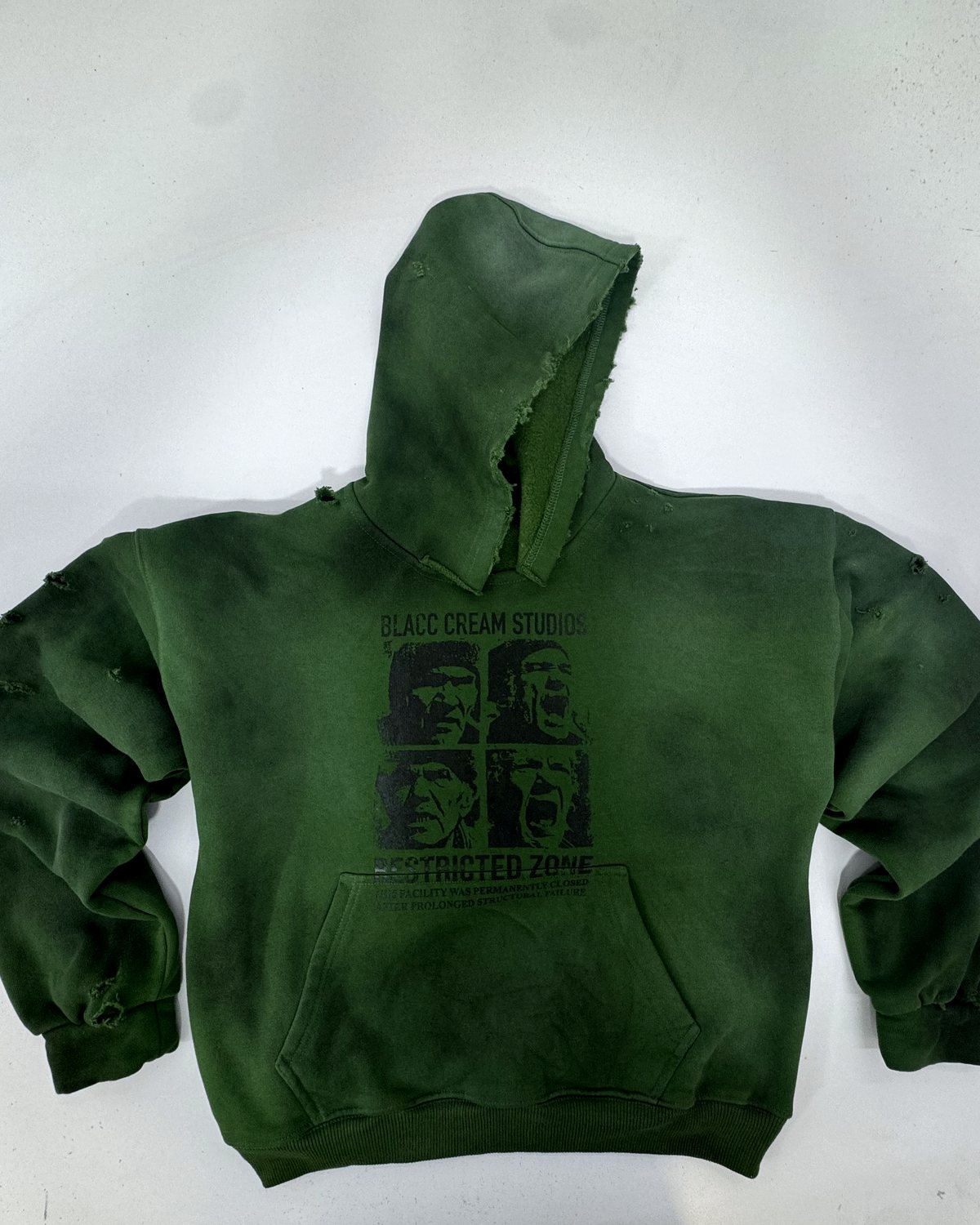 Acid-wash green hoodie, the same body and print as the grey and burgundy